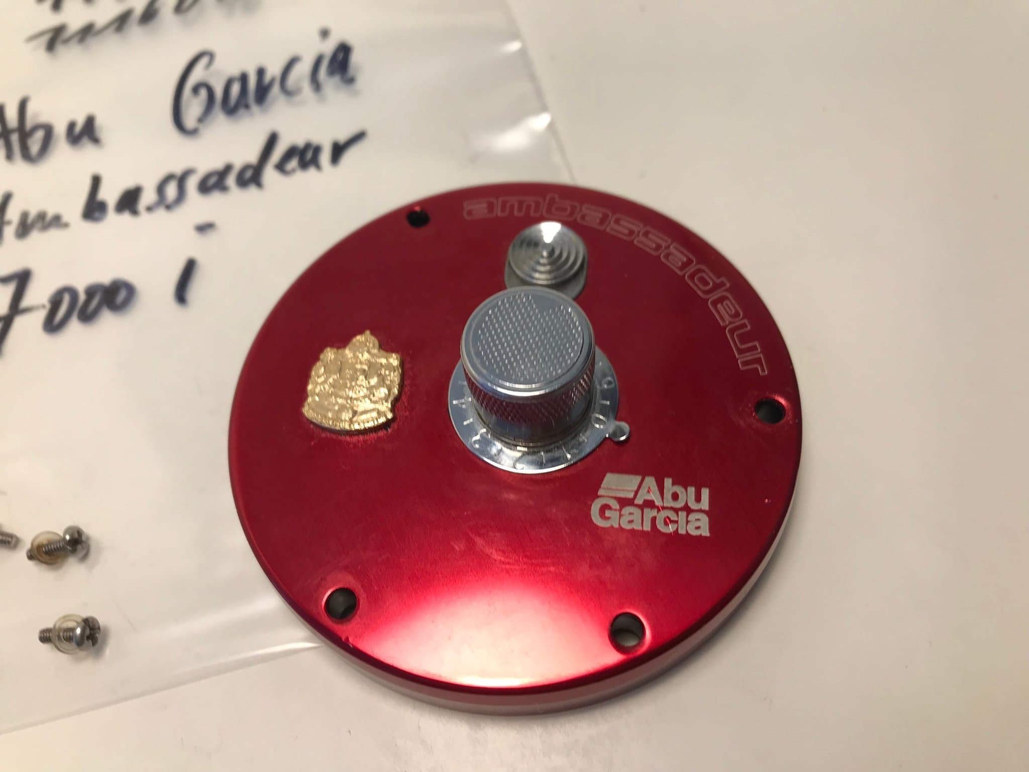 reservdel Abu Garcia Ambassadeur 7000i, här:1116103+++sidoplåt vänster komplett