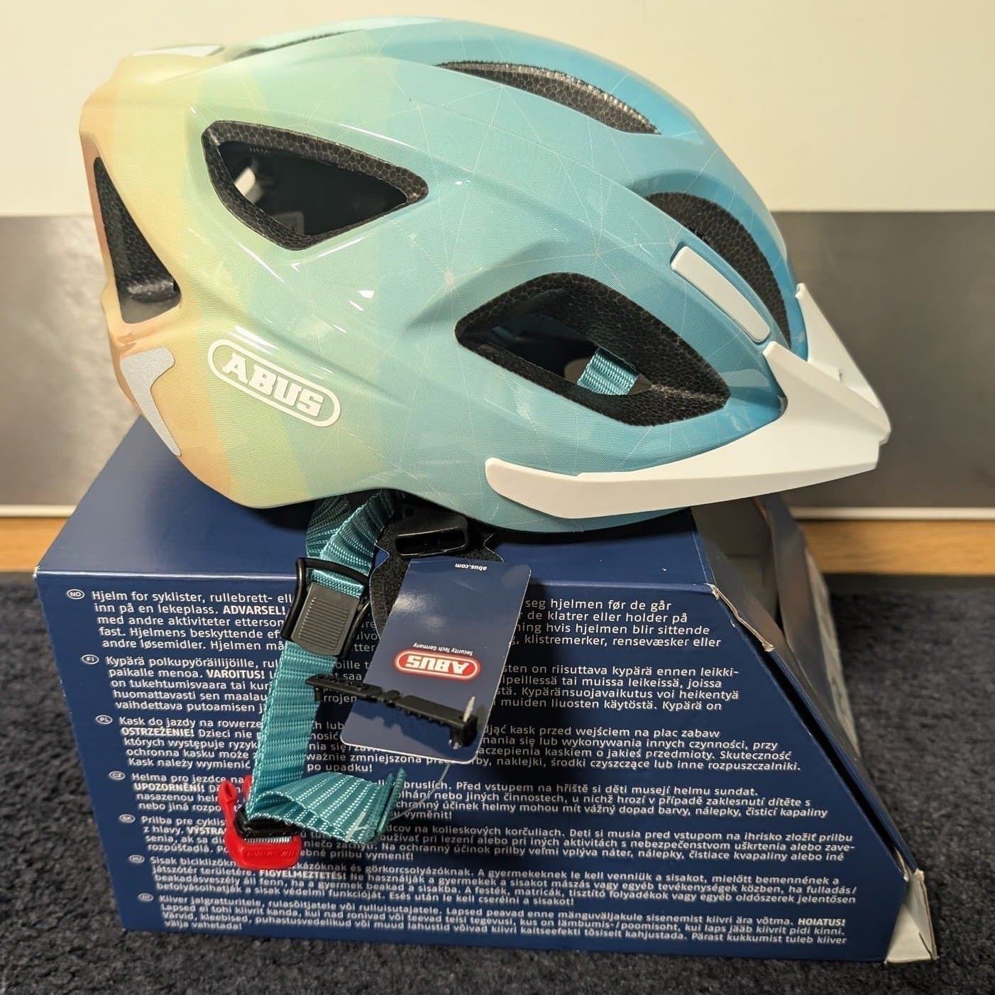 ABUS Aduro 2.0 Cykelhjälm (med bakljus) Blue Art - Storlek S (51–55 cm)