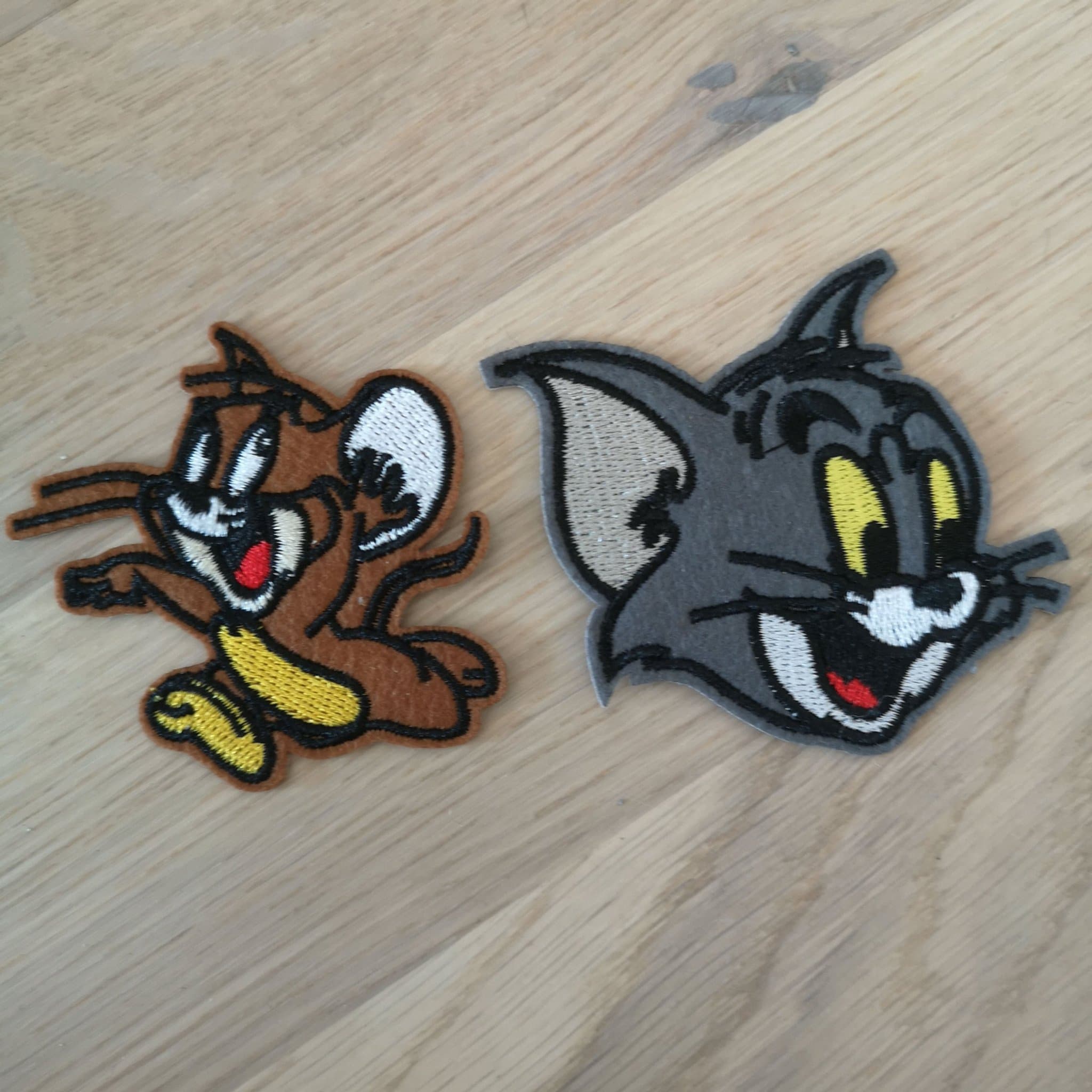 Tom och Jerry Tygmärken