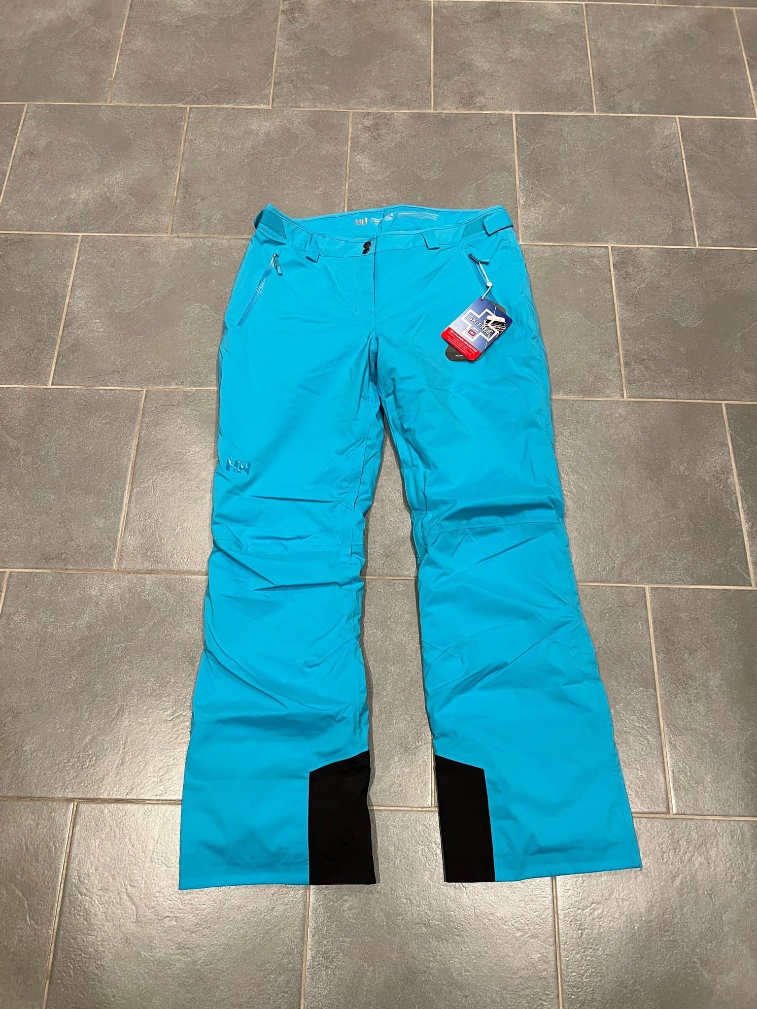 Helt nya Helly Hansen turkosa skidbyxor Legendary Insulated Ski Pants strl XL