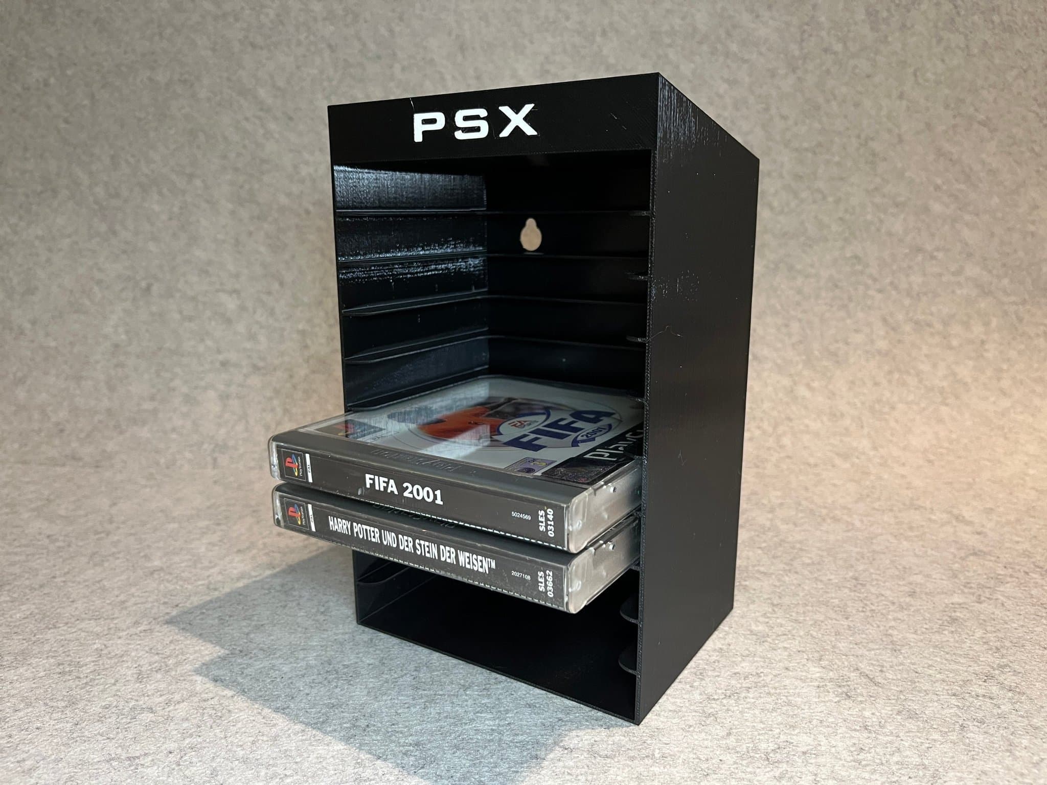 Vägghållare / spelställ för 10 spel till PlayStation 1 (PSX)