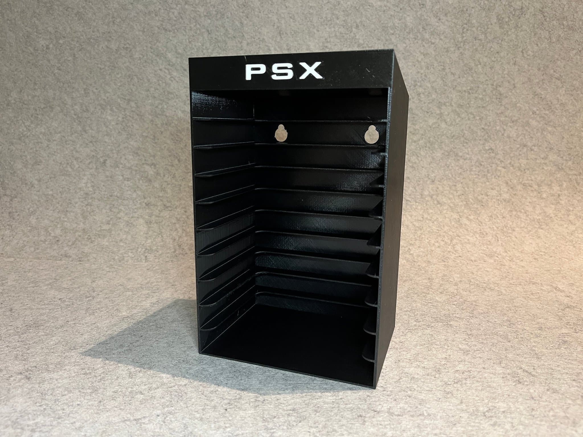 Vägghållare / spelställ för 10 spel till PlayStation 1 (PSX)