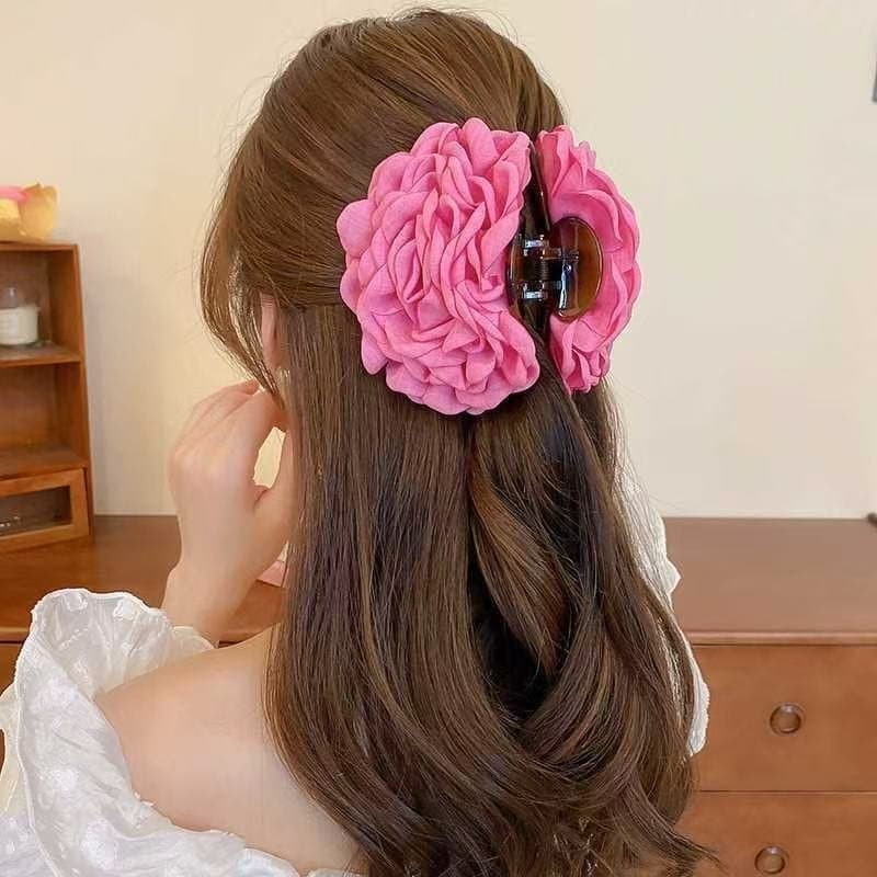 Kreativt handgjort rosa hårspänne med blomma