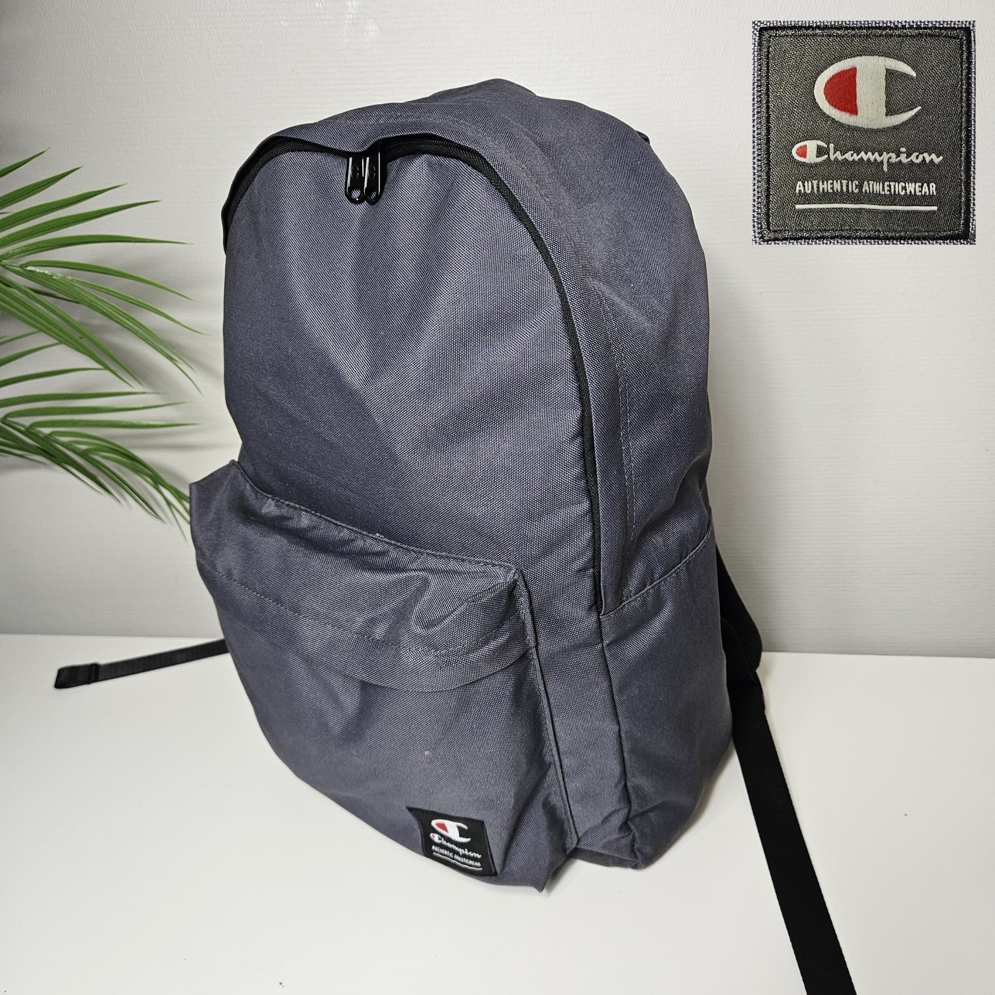 Fin Champion grå ryggsäck - NYSKICK - träning jobbet skola utflykt