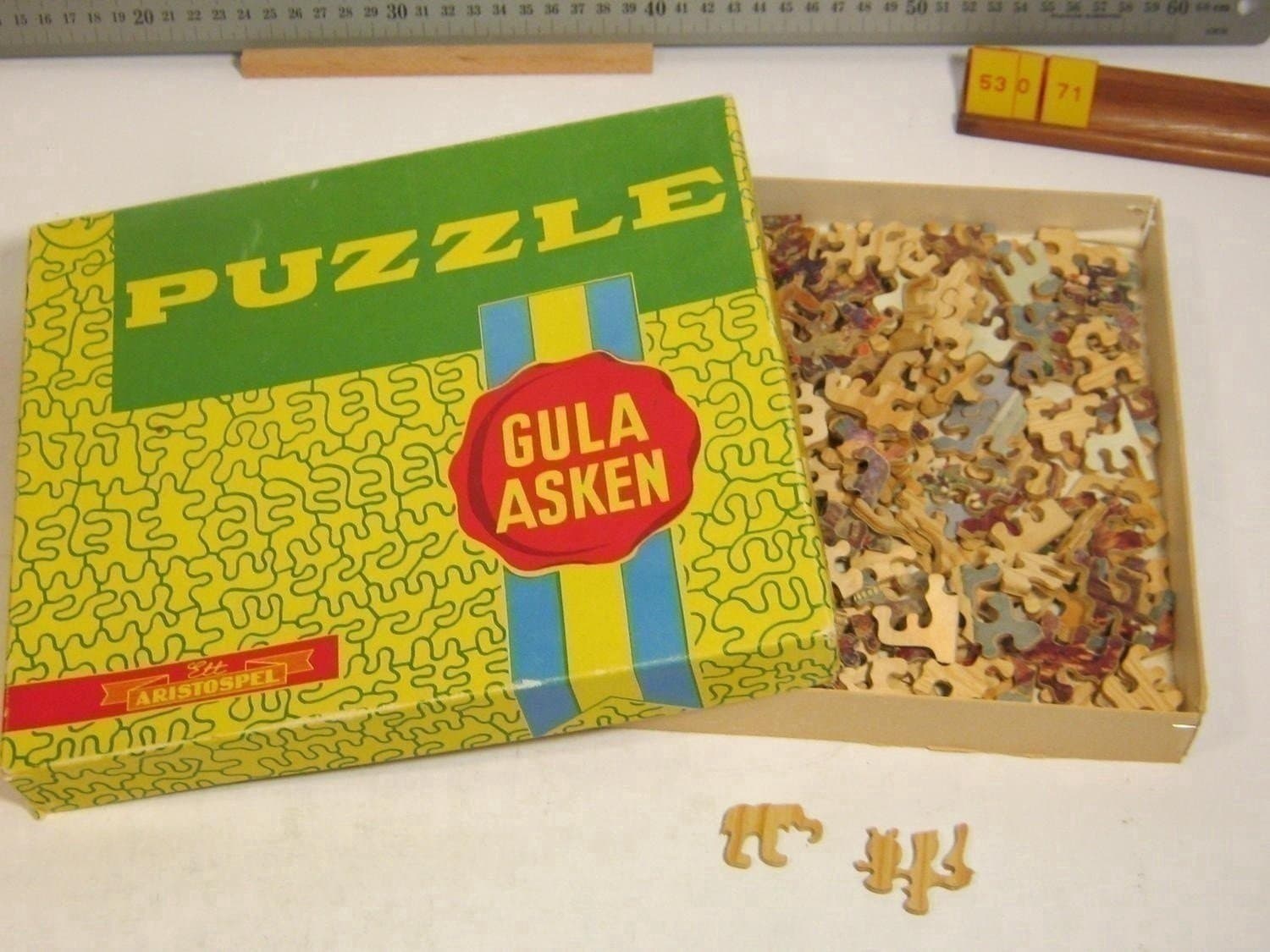 250 b Figur-pussel i trä, Aristospel 60-tal; Undanskymd plats f-mf/mf