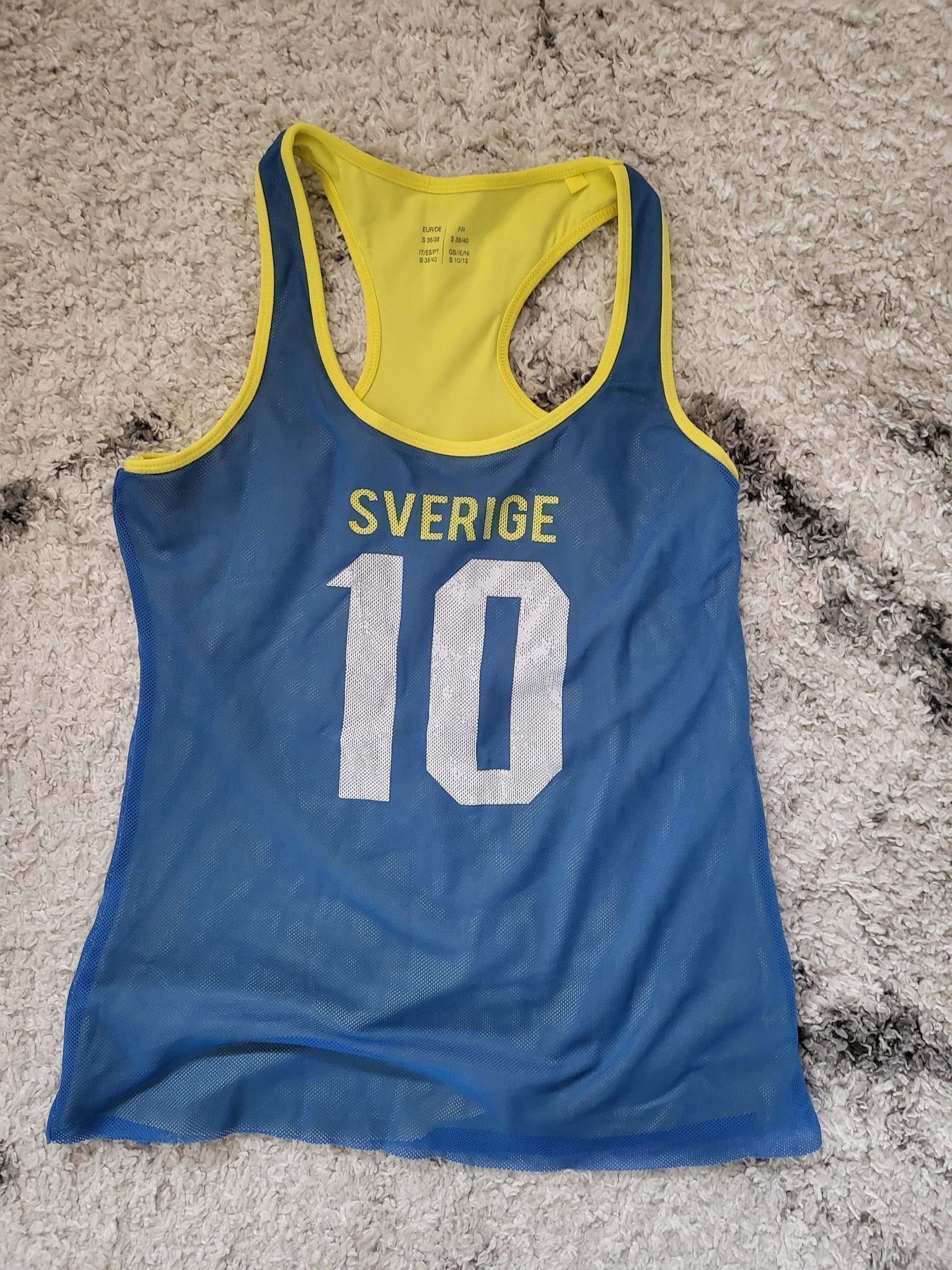 Oanvänt basketball väst stl 38/40