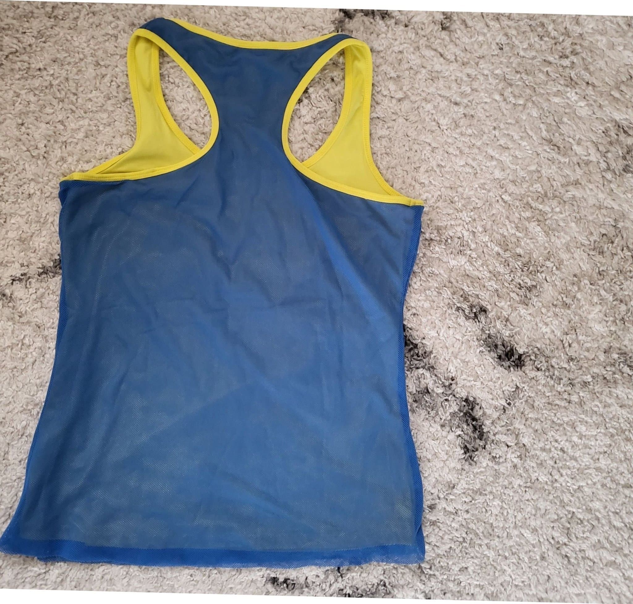 Oanvänt basketball väst stl 38/40