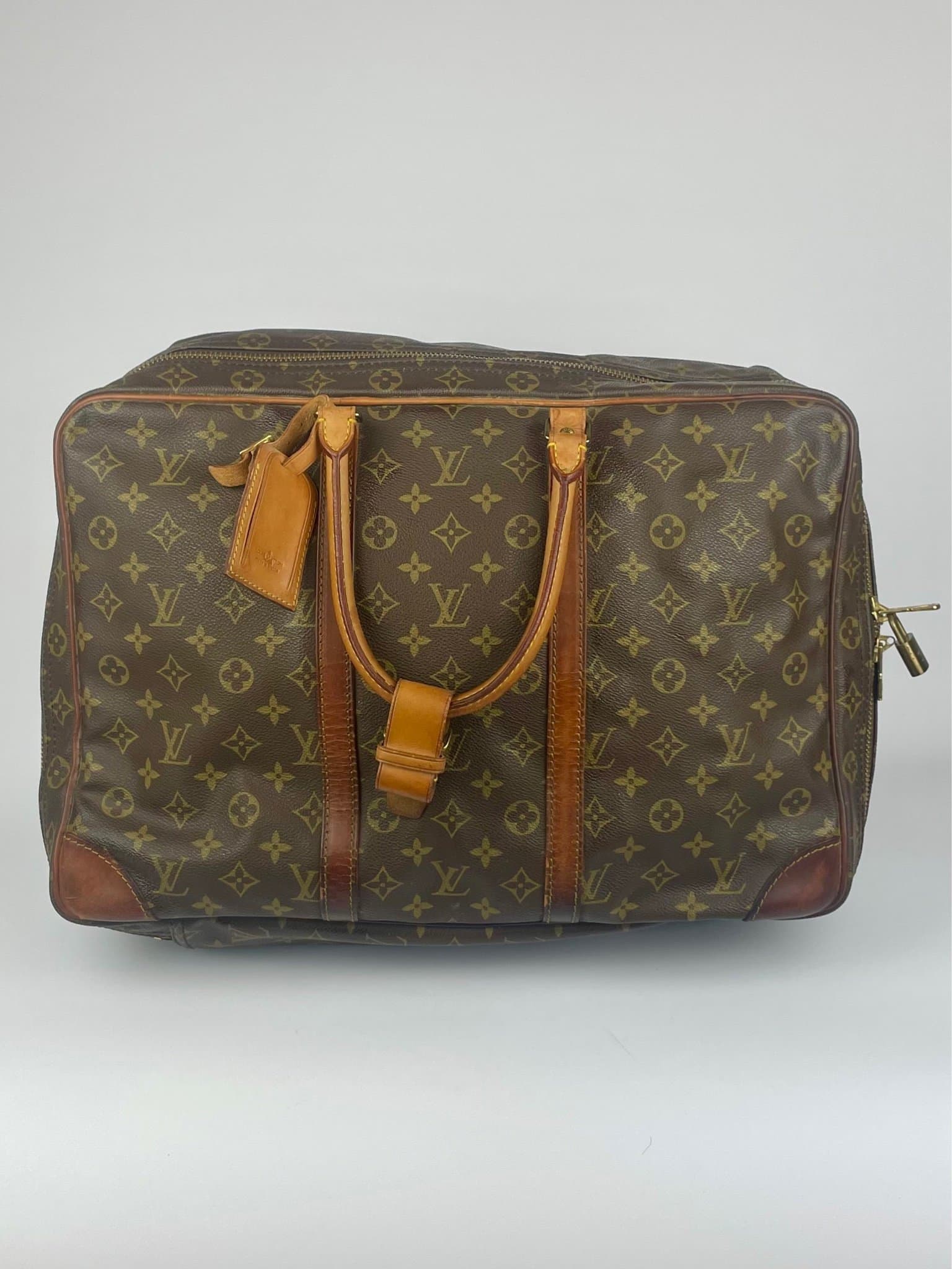 Louis Vuitton brun resväska