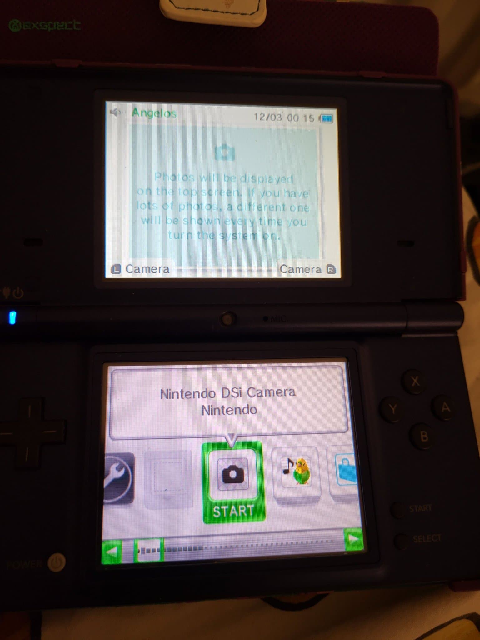 Nintendo DSi Blue + Wallet Case + Plastic Covers + 4GB SD