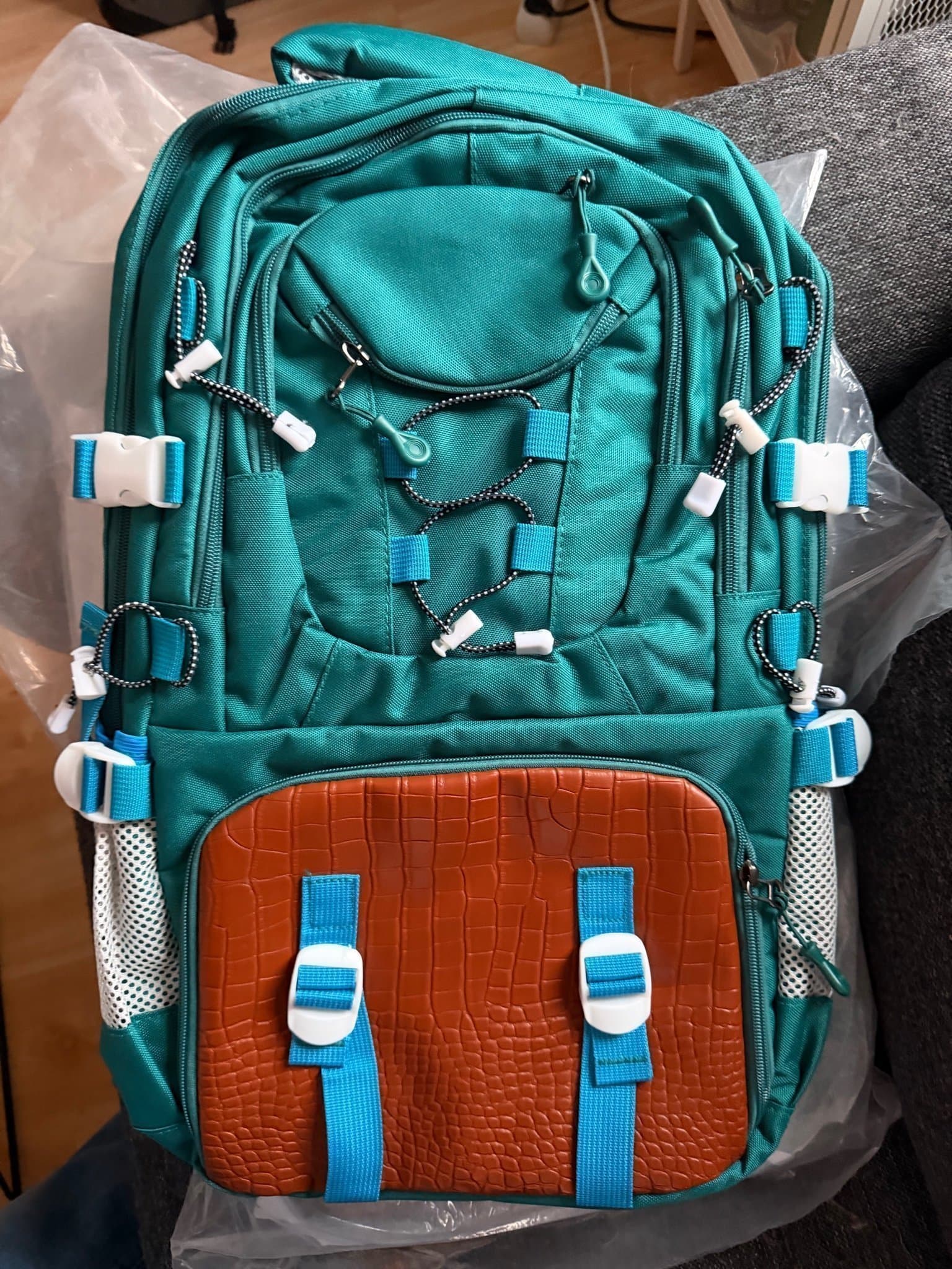 Grön och brun ryggsäck