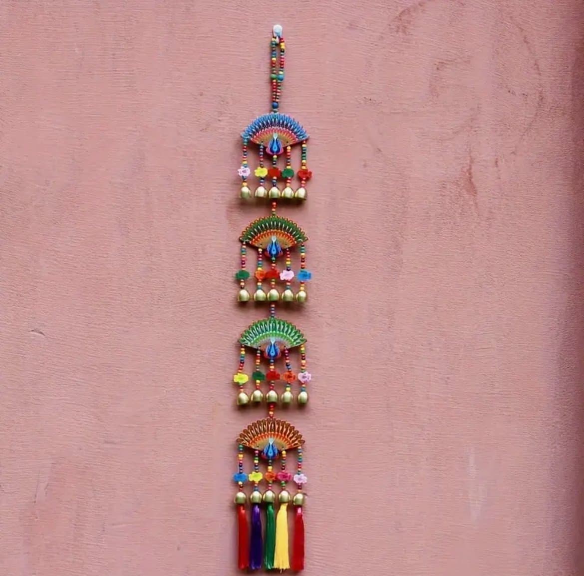 LÅNG Väggdekoration med bjällror