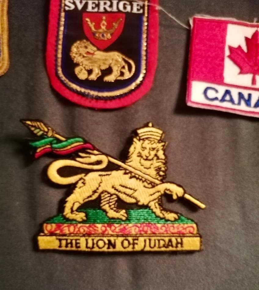 Set med 8 Tygmärken - Afrika, USA, Kanada, Sverige m.fl.