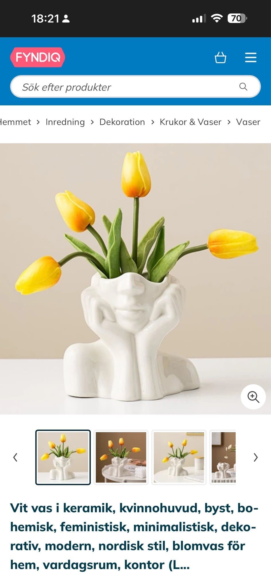 Vit keramisk vas i form av kvinnohuvud