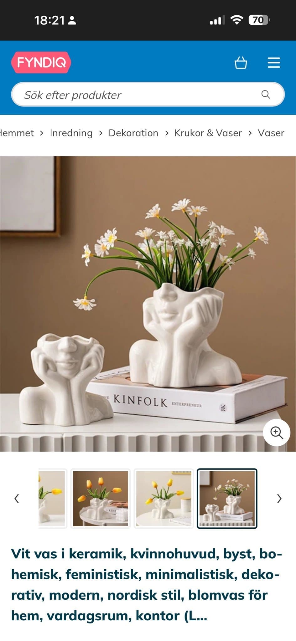 Vit keramisk vas i form av kvinnohuvud