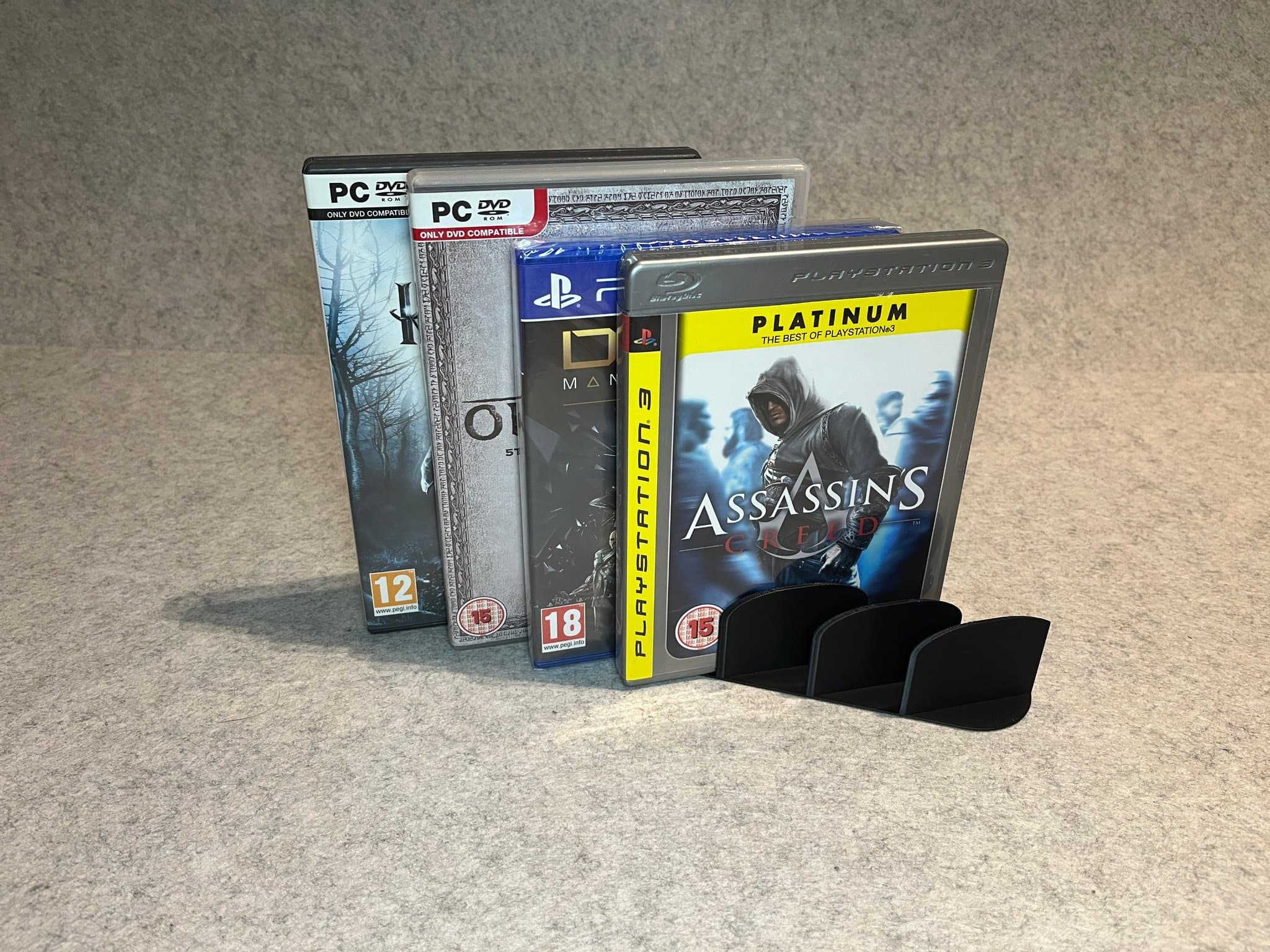 Display ställ för 6 spel till Xbox, PlayStation, Wii, 3DS eller PC