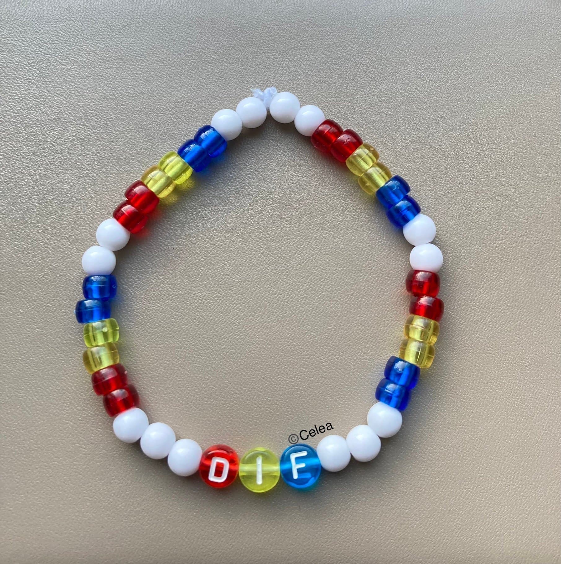 DIF elastiskt armband fotboll hockey accessoar smycke budskapsarmband