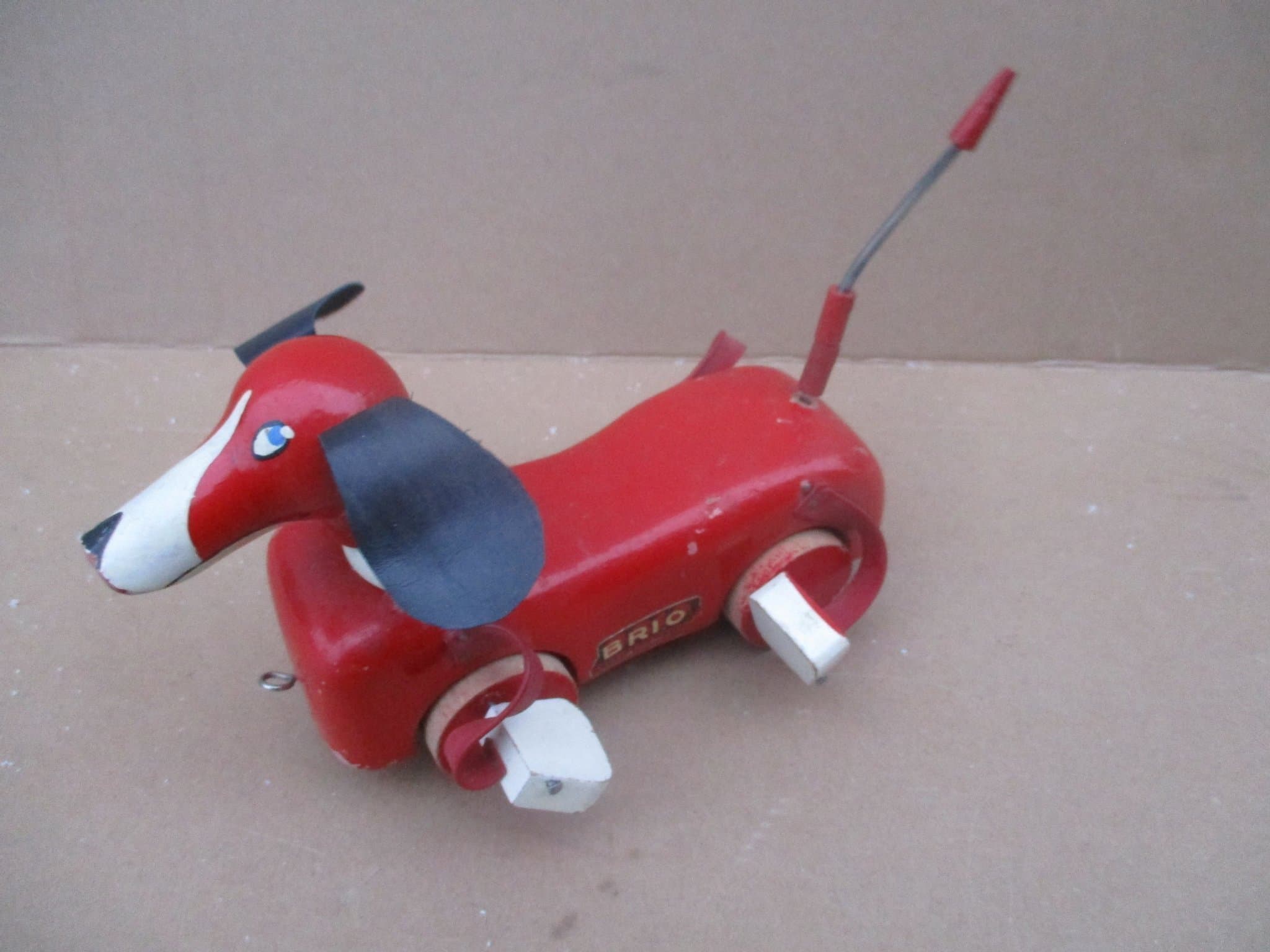 Brio hund av trä träsamlarsaker