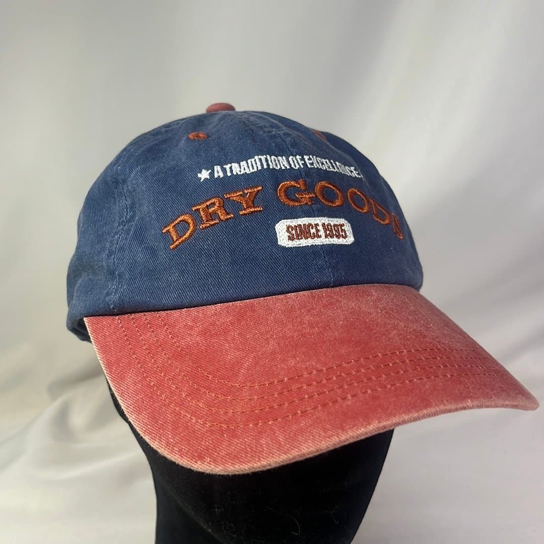 American Vintage Dry Goods mörkblå keps, rödbrun keps