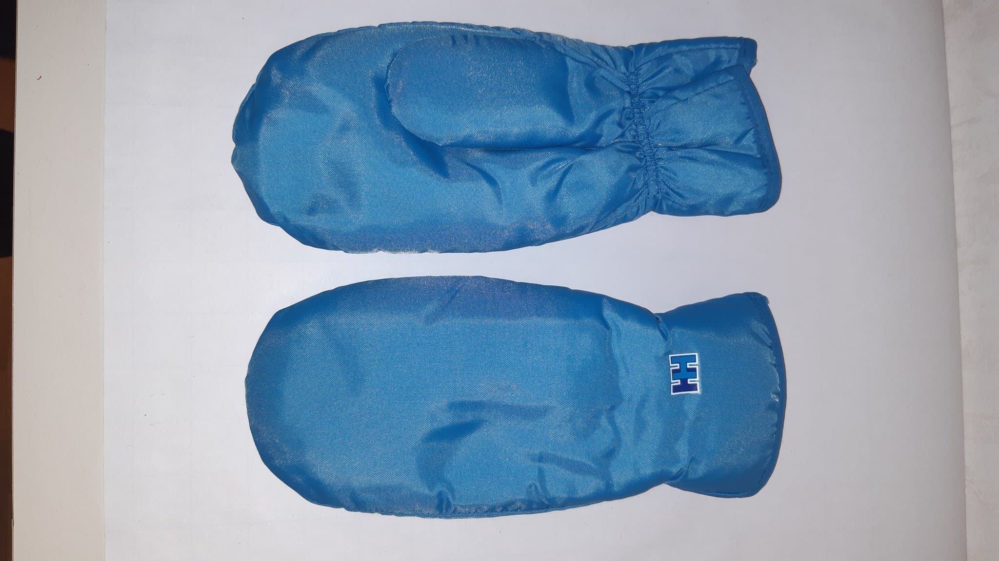 Helly Hansen fiberpäls ljusblå tumvantar, storlek 7 - nyskick