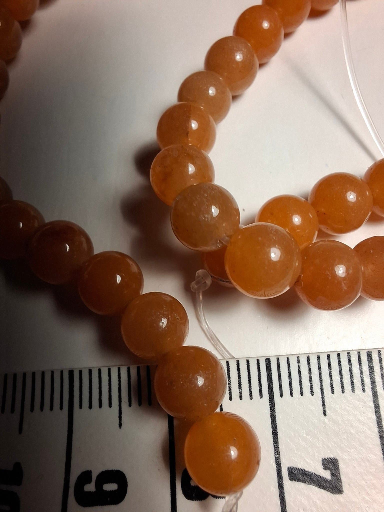 Sträng Aventurin 40 cm lång. Pärla 6 mm.