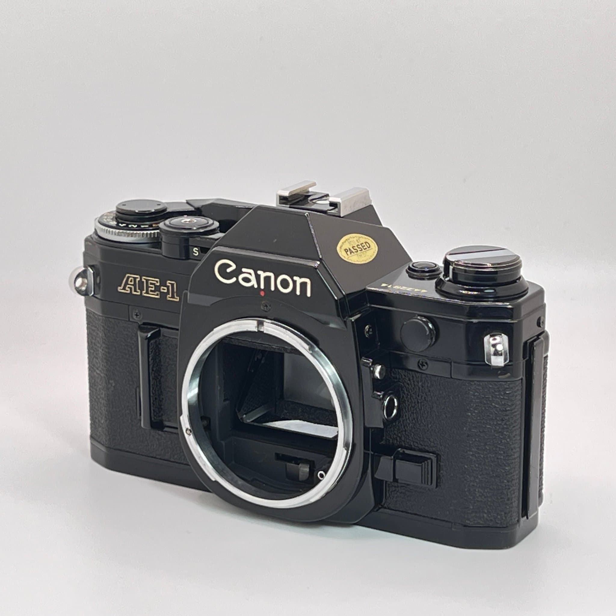 Svart Canon AE-1 kamerahus – Fullt fungerande