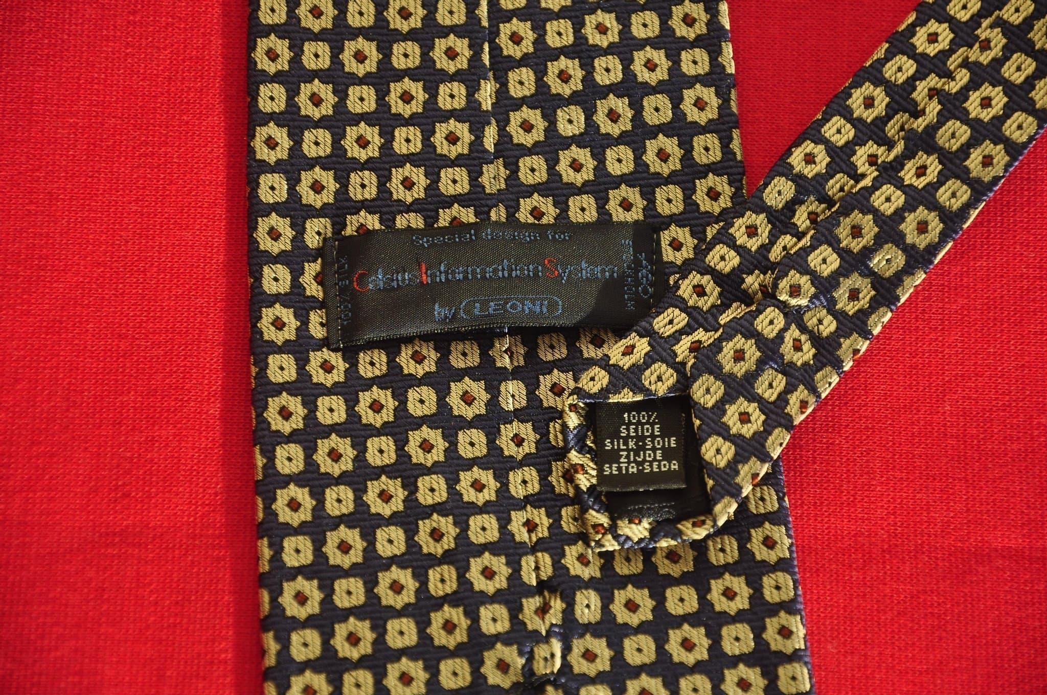 LEONI mörkblå och guldfärgad slips,silke.NY.