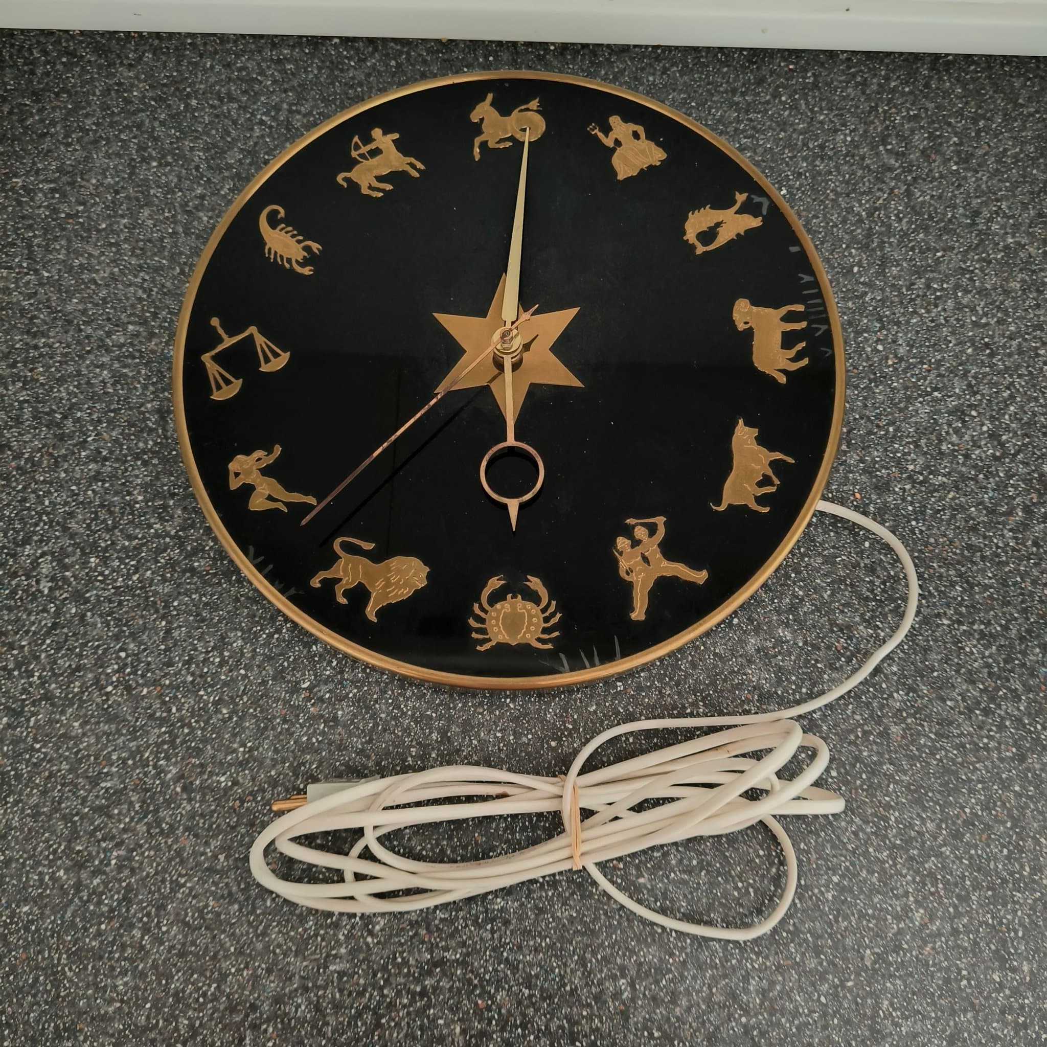 Väggklocka med stjärntecken – Lund & Clausen, Köpenhamn