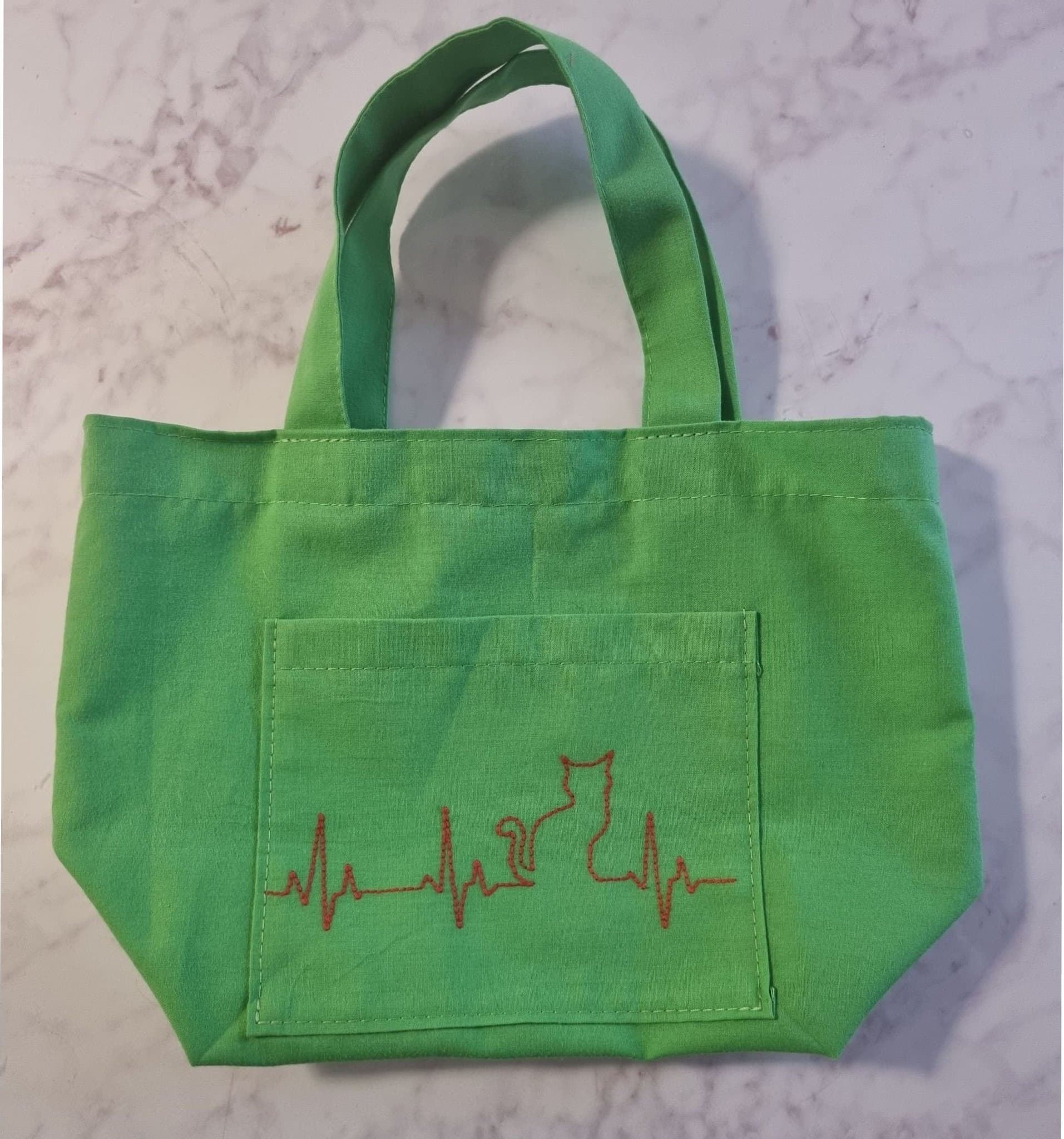 Mini tygkasse grön katt