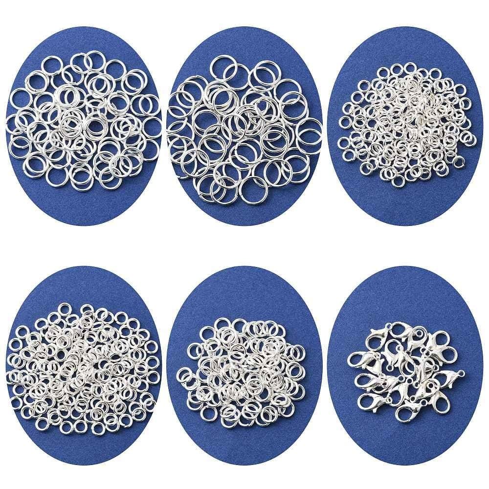 Smyckesdetaljer i vitmetall