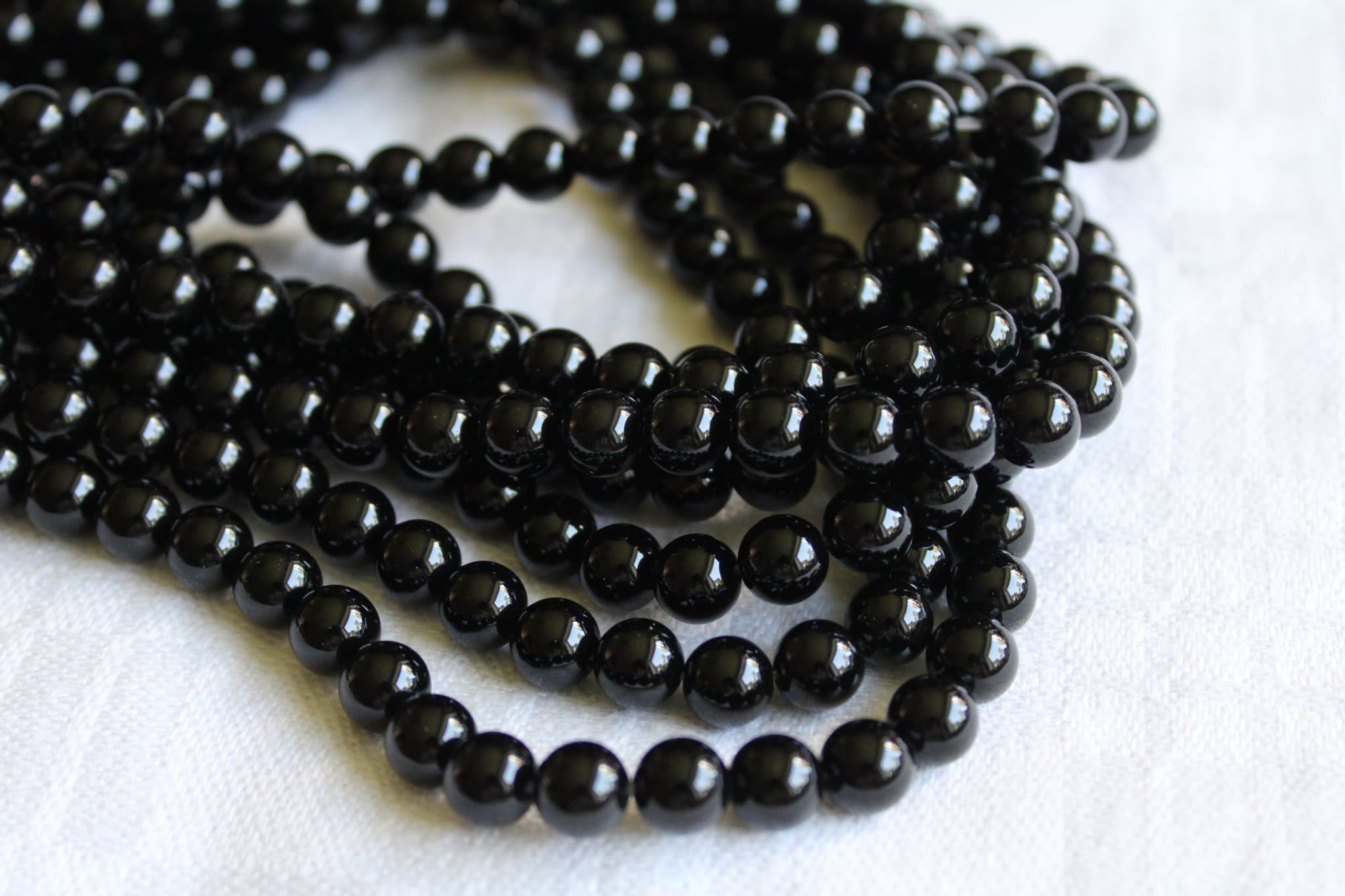 1 sträng Onyx 8 mm Grad A