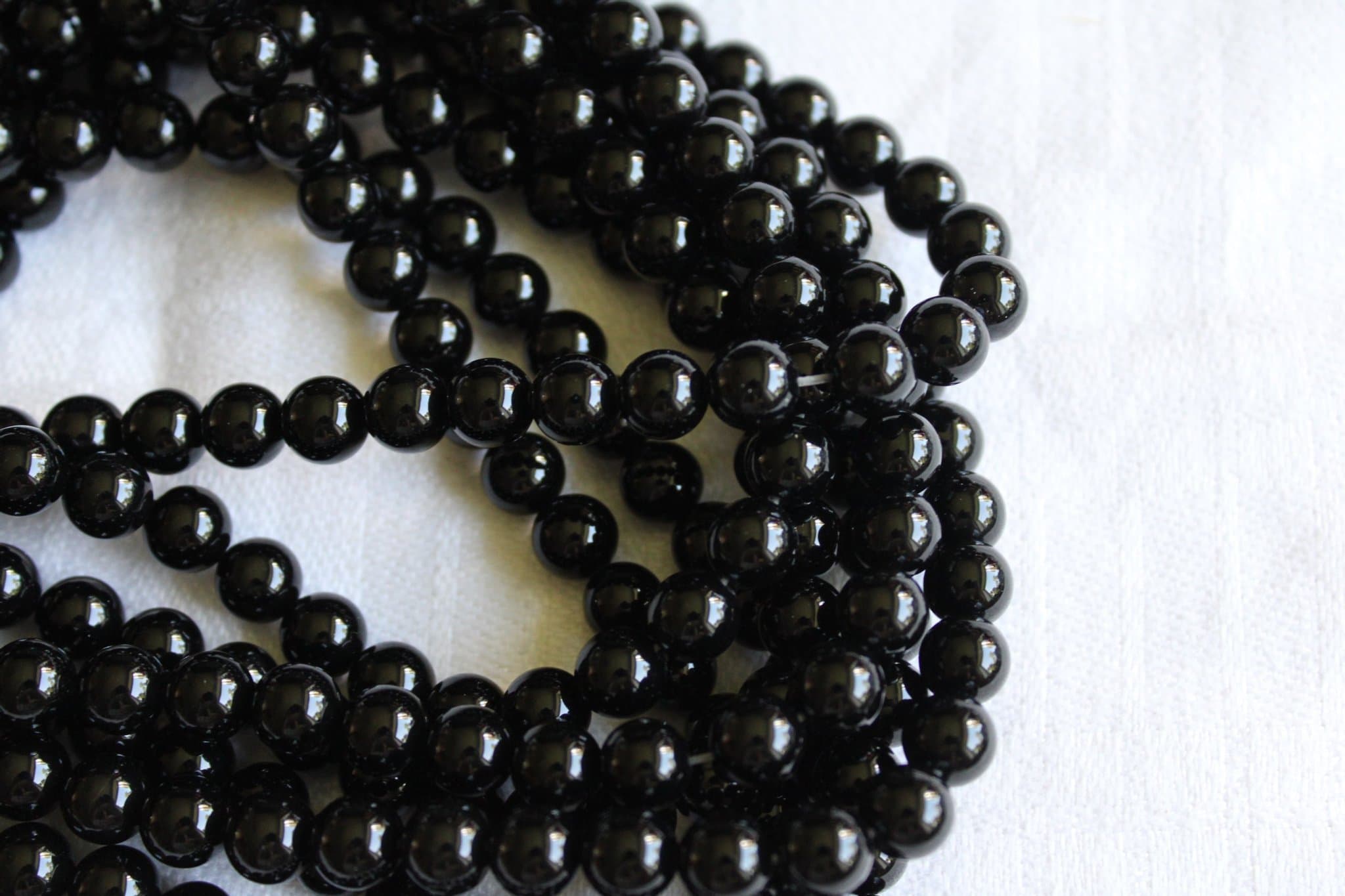 1 sträng Onyx 8 mm Grad A