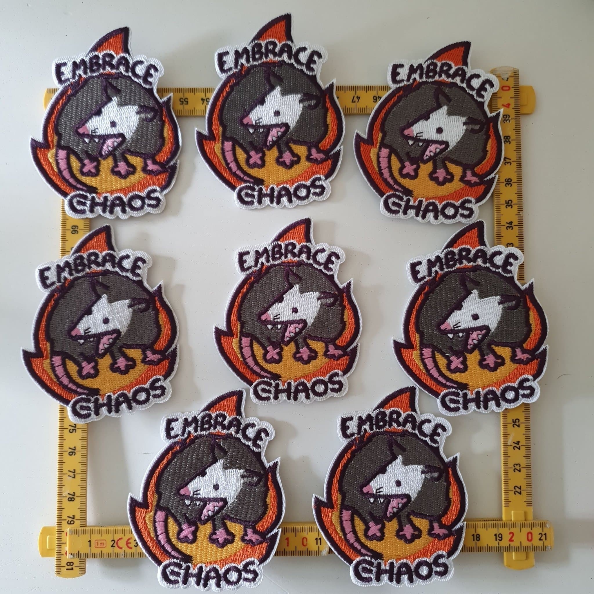 8 st Tygmärken - Embrace Chaos Opossum