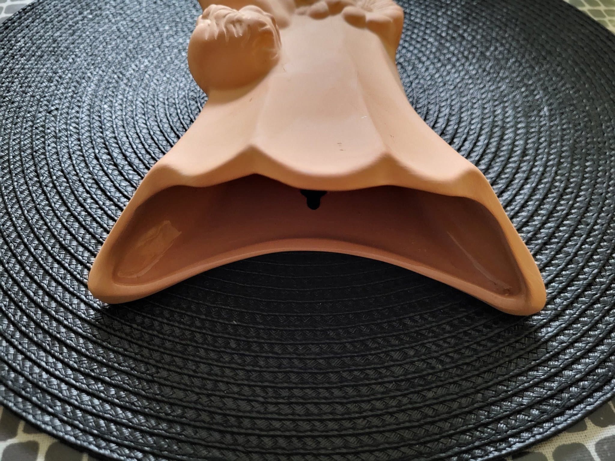 Väggkruka/väggprydnad i terracotta lergods