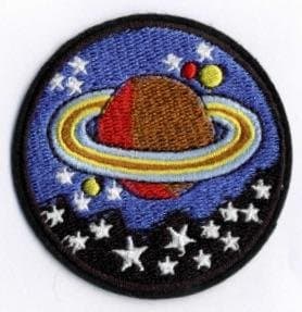 Tygmärke - Saturnus -