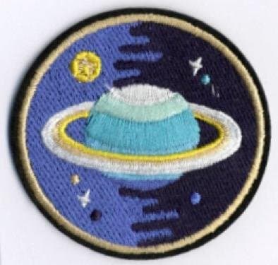 Saturnus - tygmärke -