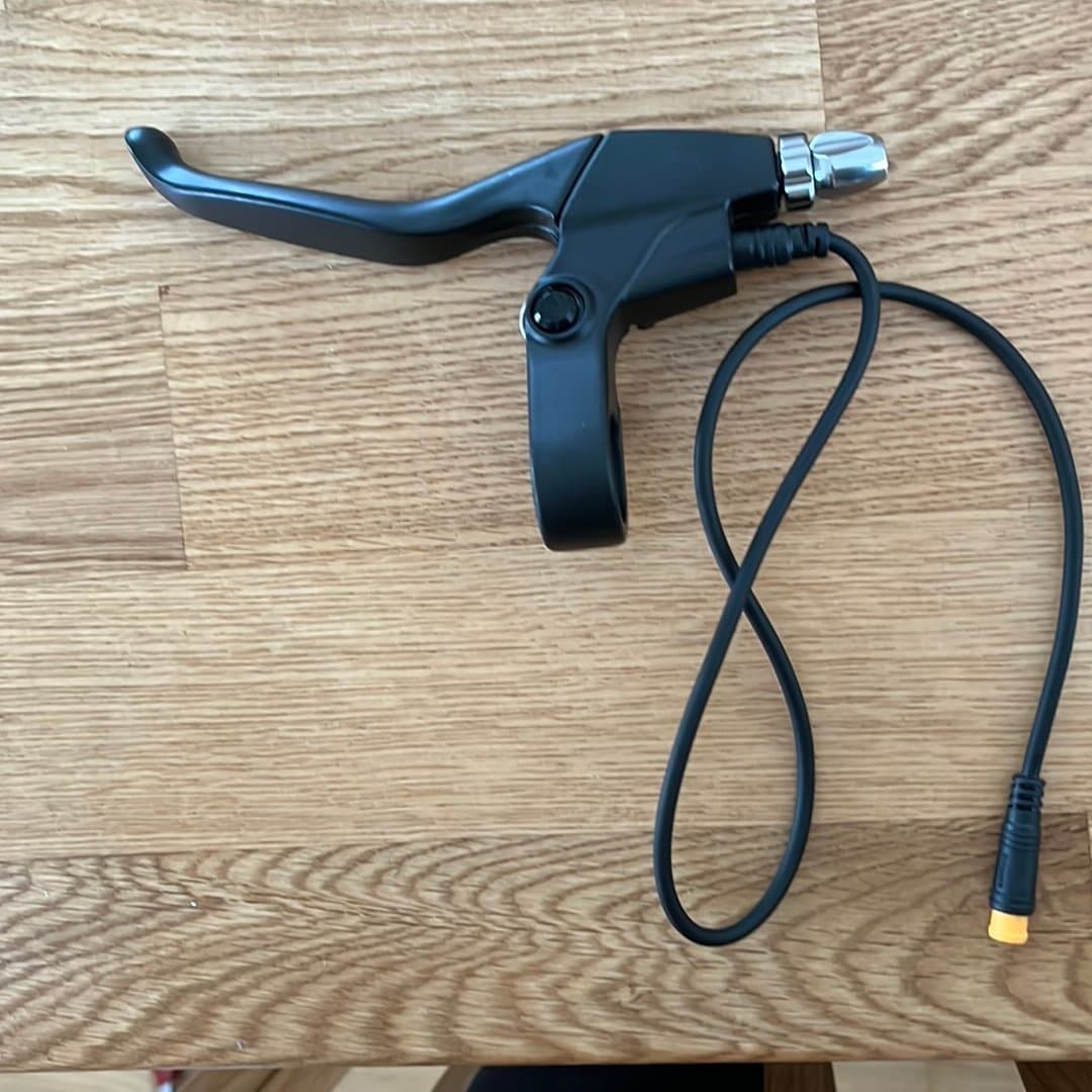 Bromshandtag vänster med sensor