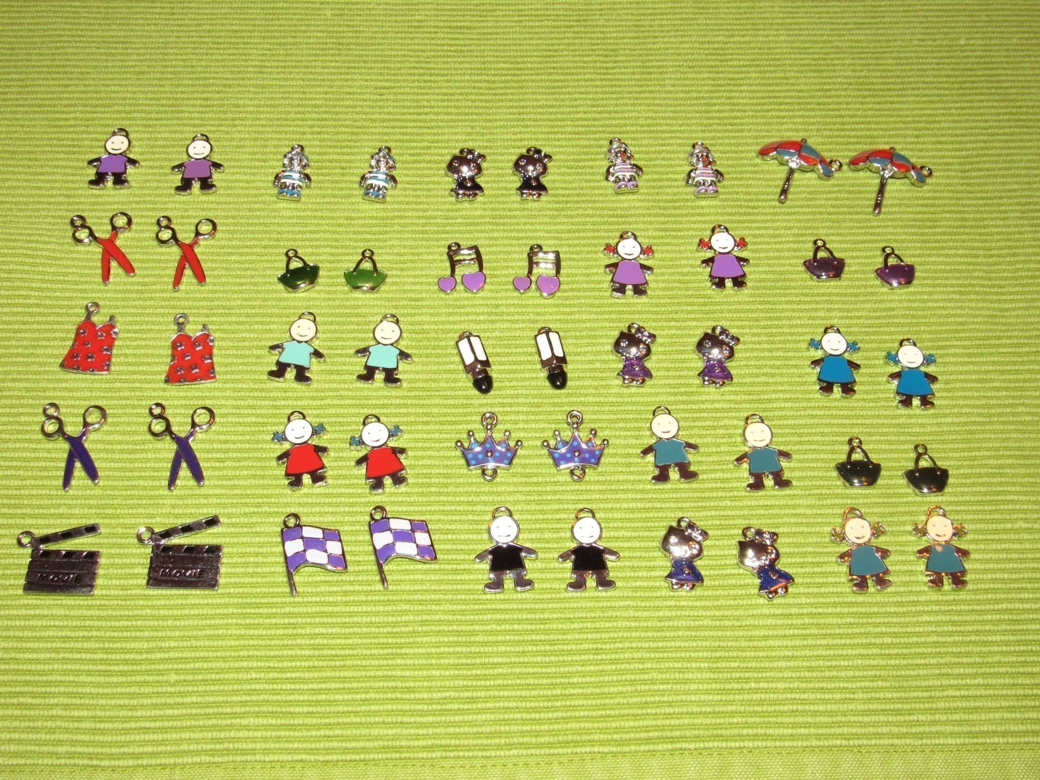 Emalj berlocker 50 st/25 par silverfärgade vintage.