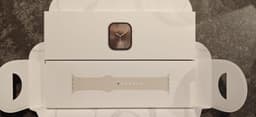 Apple Watch Series 10 GPS + Cell 42 mm guld titan, stjärnglans sportband - M/L