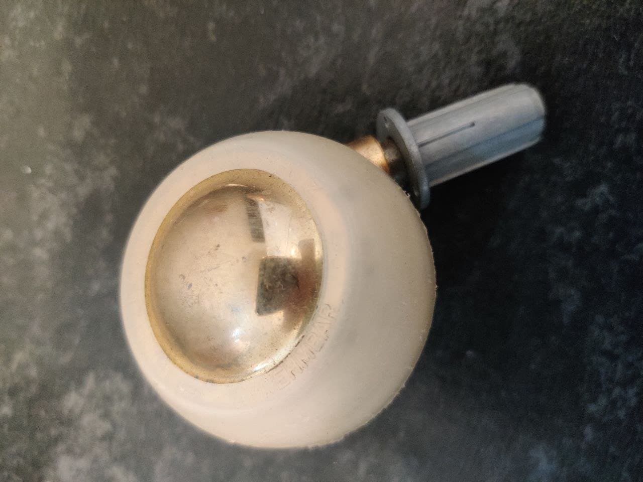 4 Vintage Brass and Plastic Ball Casters