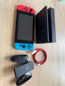 Nintendo Switch konsol med Joy-Cons och dockningsstation