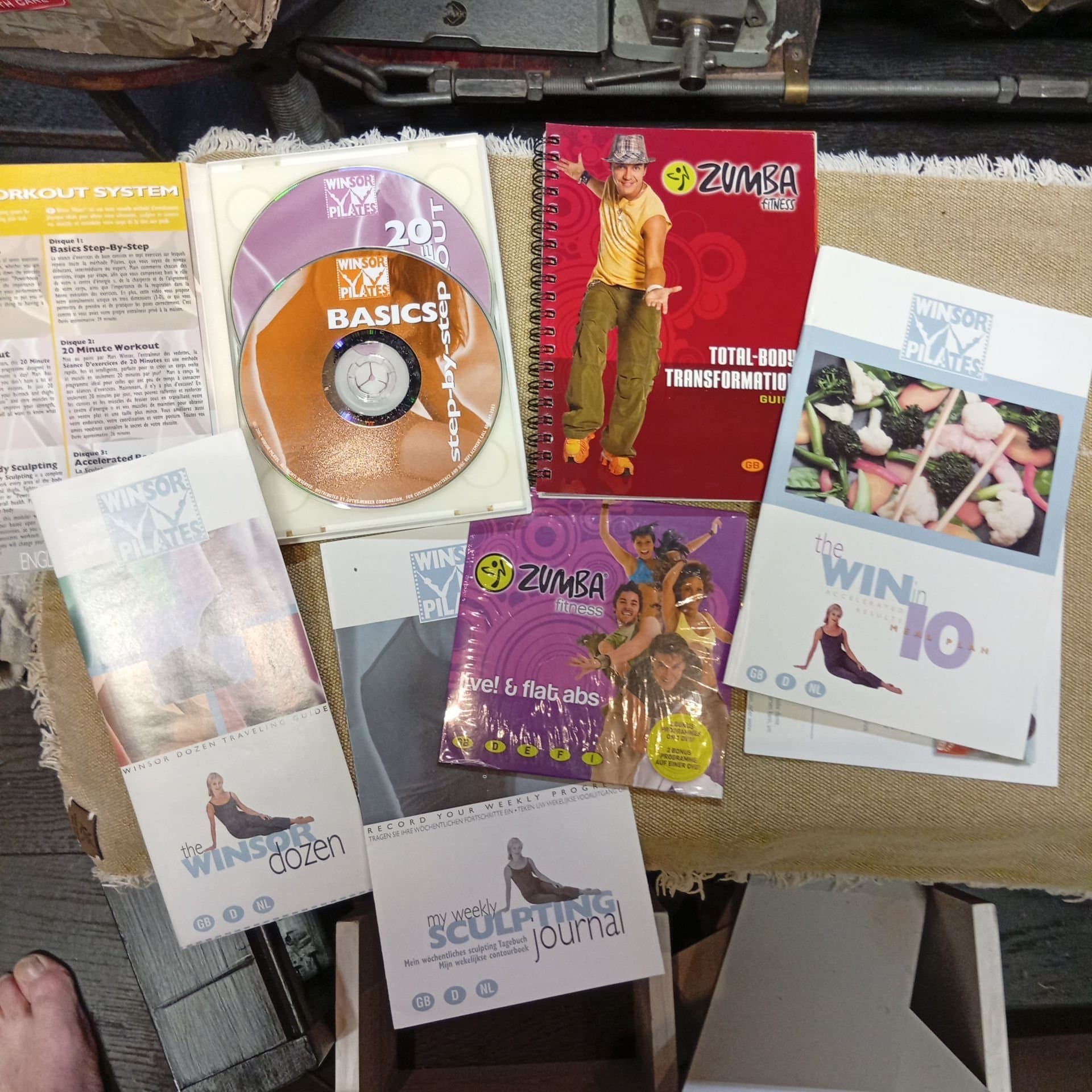 Tränings-DVD-skivor och böcker: Zumba Fitness och Winsor Pilates