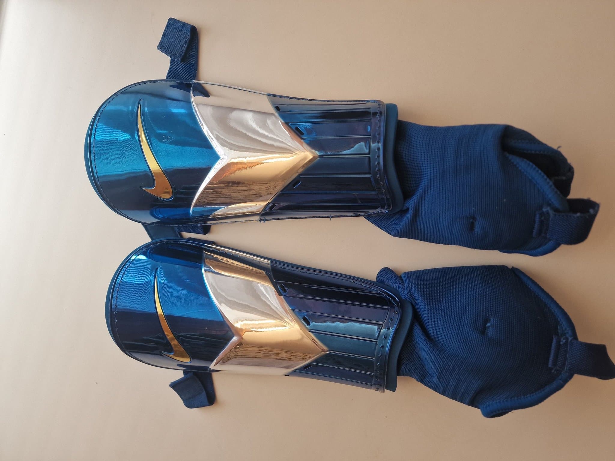 Nike benskydd i storlek TG/EG