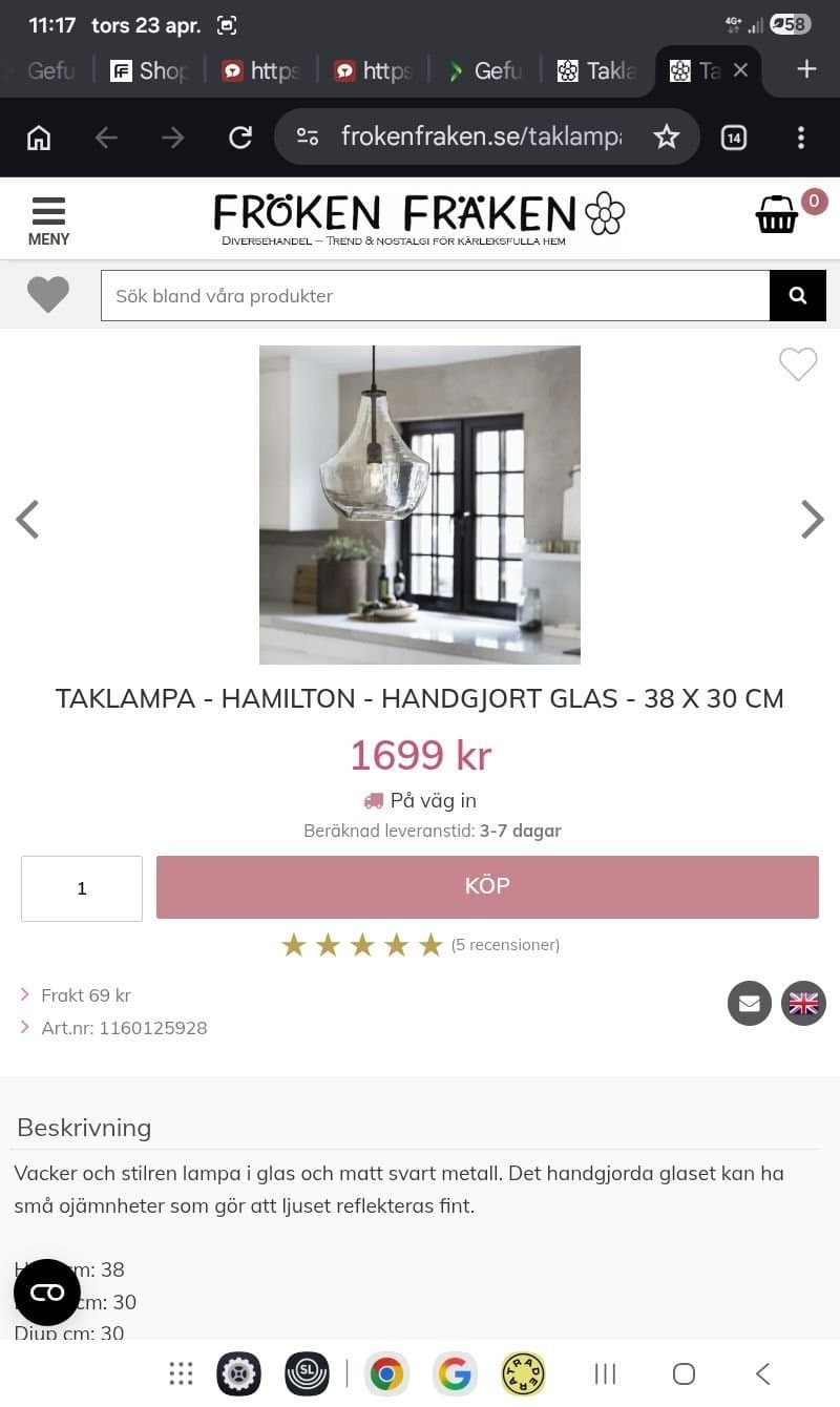 Taklampa i glas och svart metall