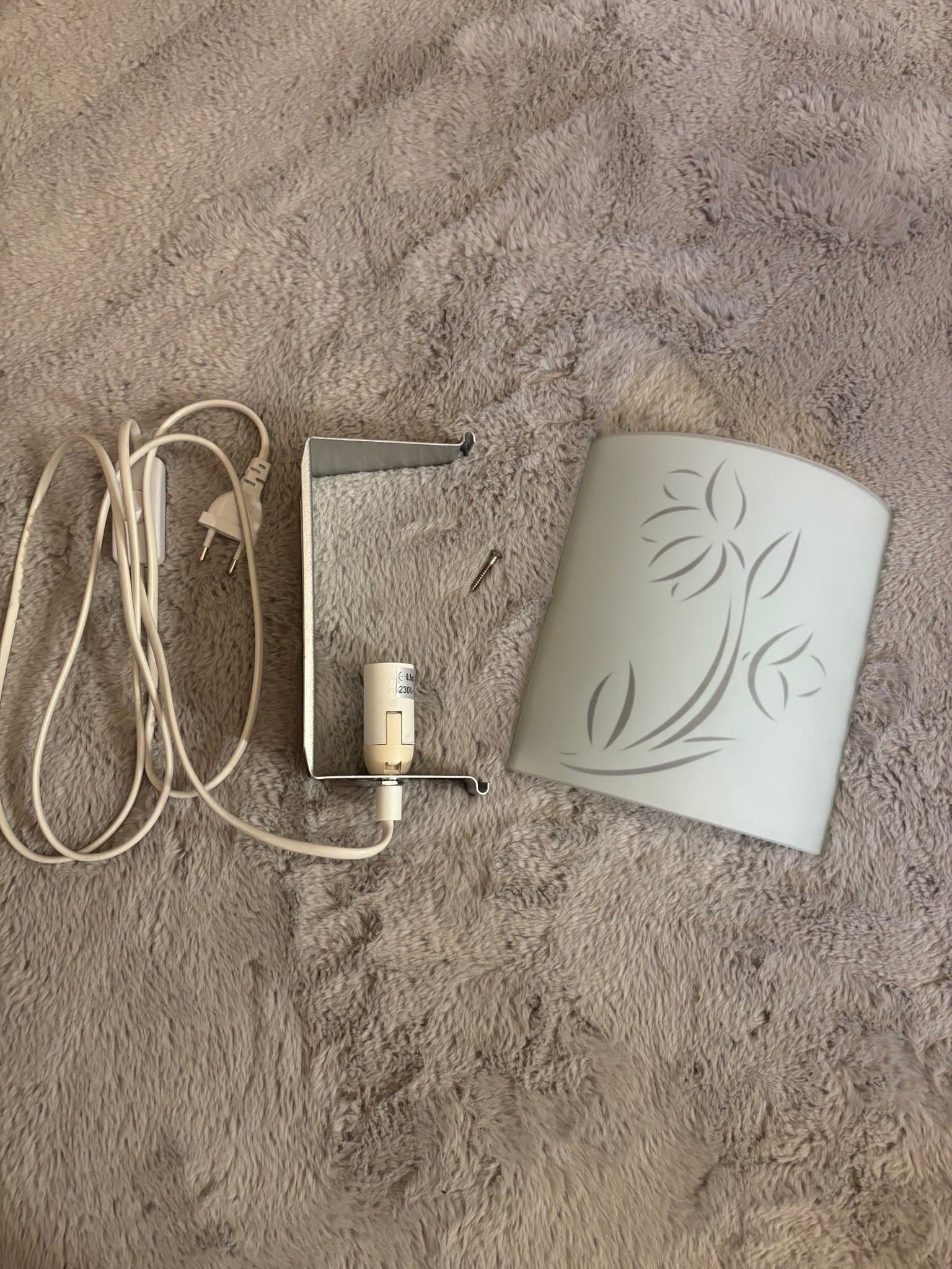 Vägglampa med blommönster