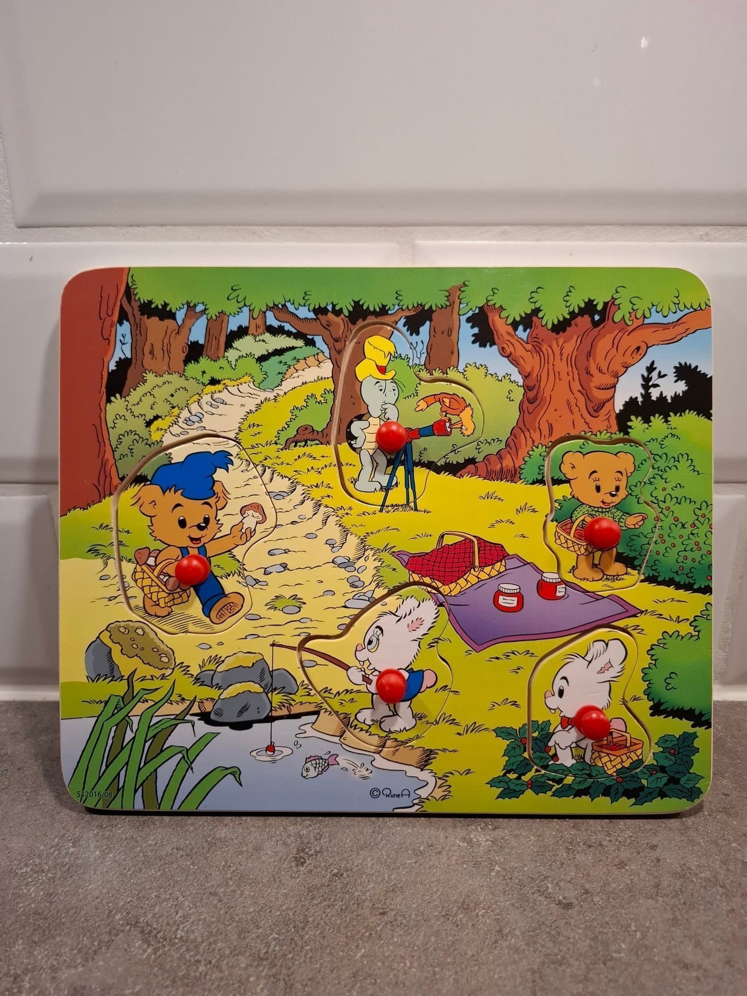 BAMSE knopppussel i trä