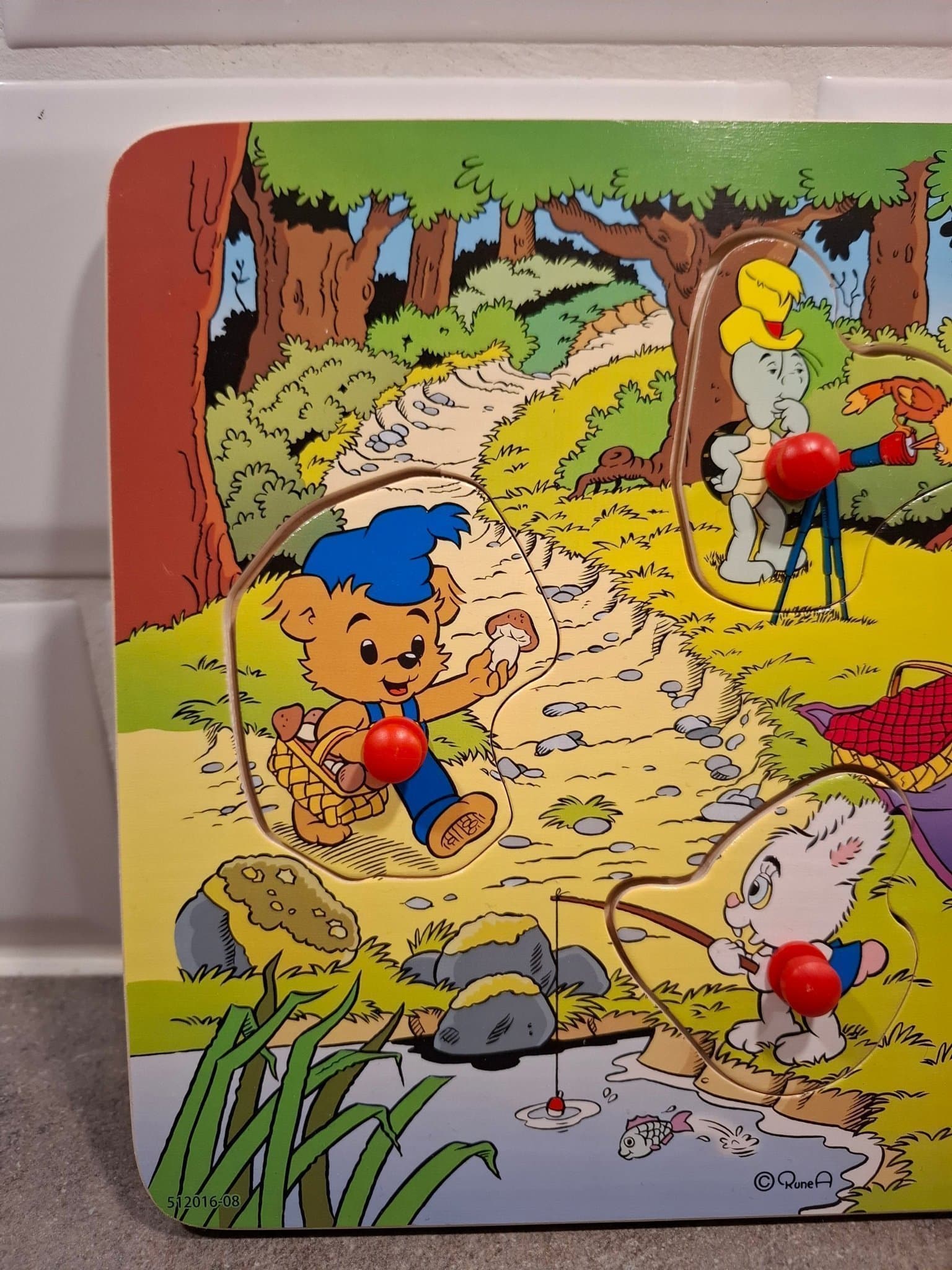 BAMSE knopppussel i trä