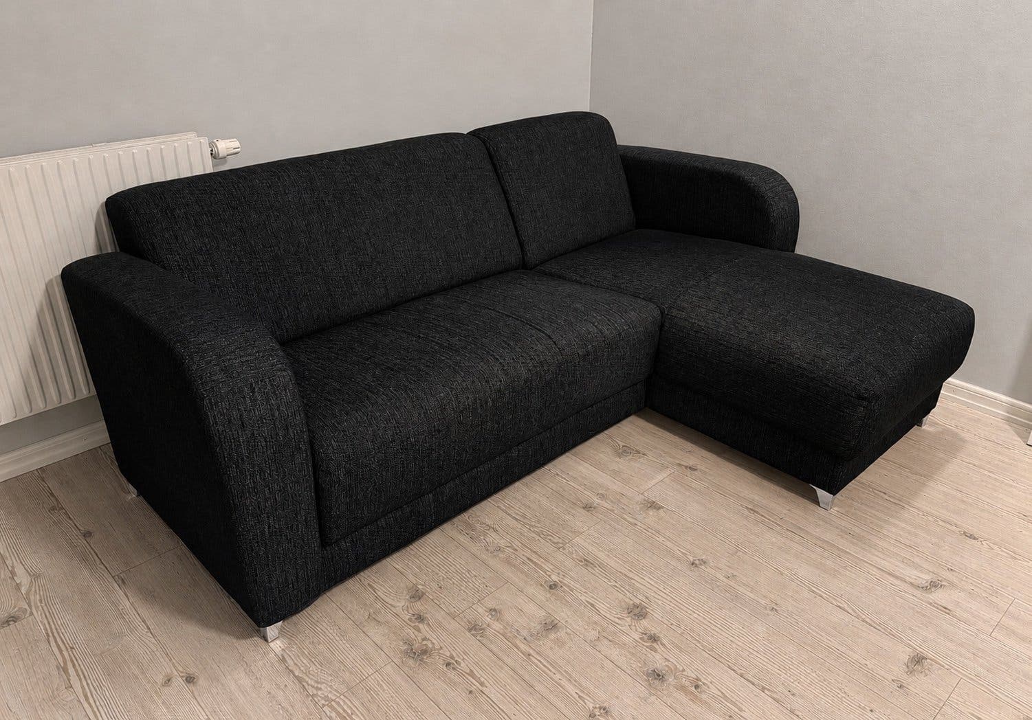 Svart divansoffa