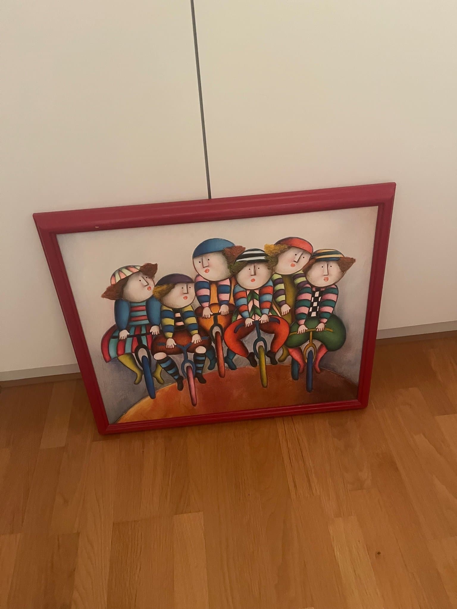 Färgstark tavla med cirkusfigurer på enhjulingar – cirka 67 x 56 cm