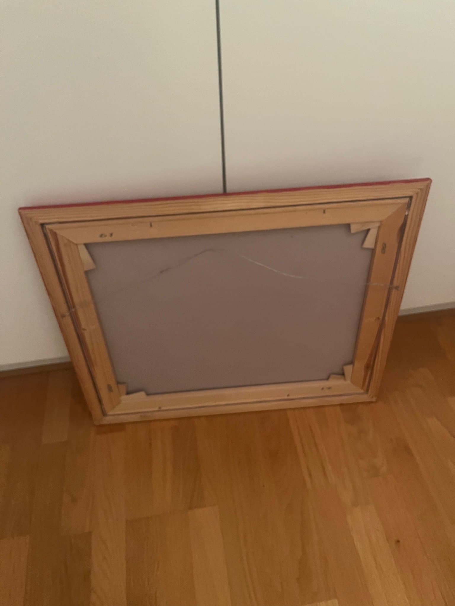 Färgstark tavla med cirkusfigurer på enhjulingar – cirka 67 x 56 cm