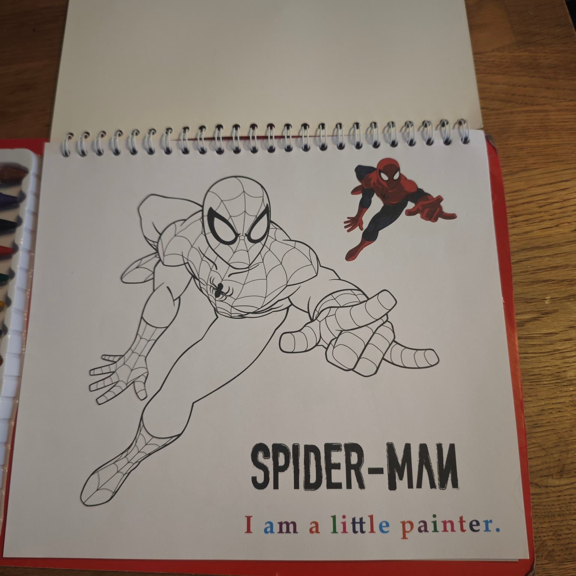 Målarbok med Spiderman-tema och färger